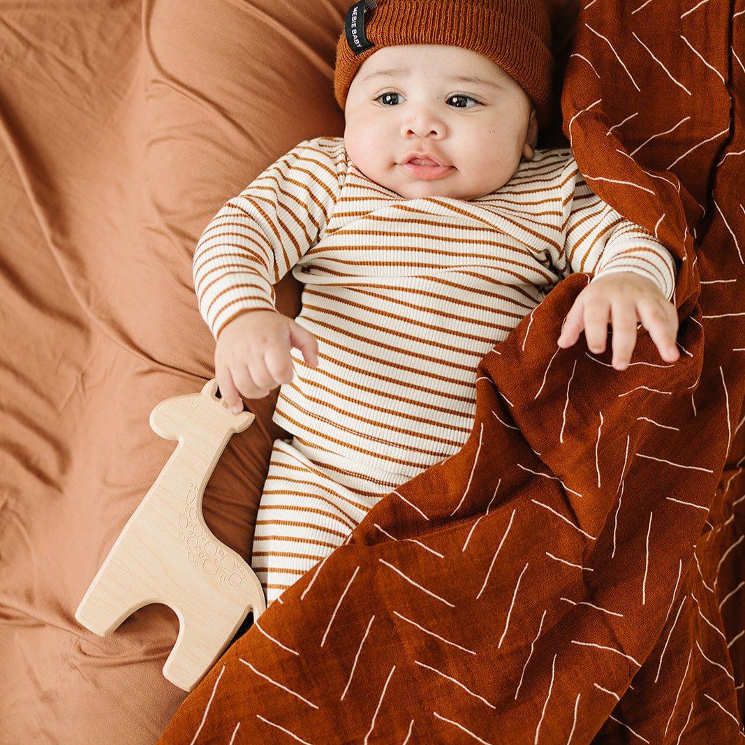 rust baby swaddle, fall baby blanket, muslin swaddle, mebie baby rust mudcloth swaddle blanket, fall baby accessories